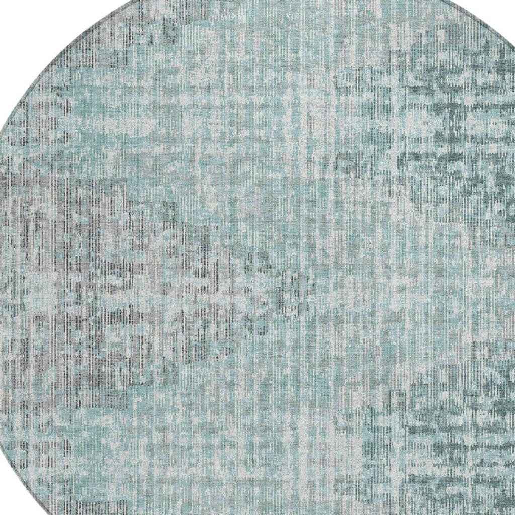 8' Teal Blue And Ivory Round Geometric Washable Indoor Outdoor Area Rug