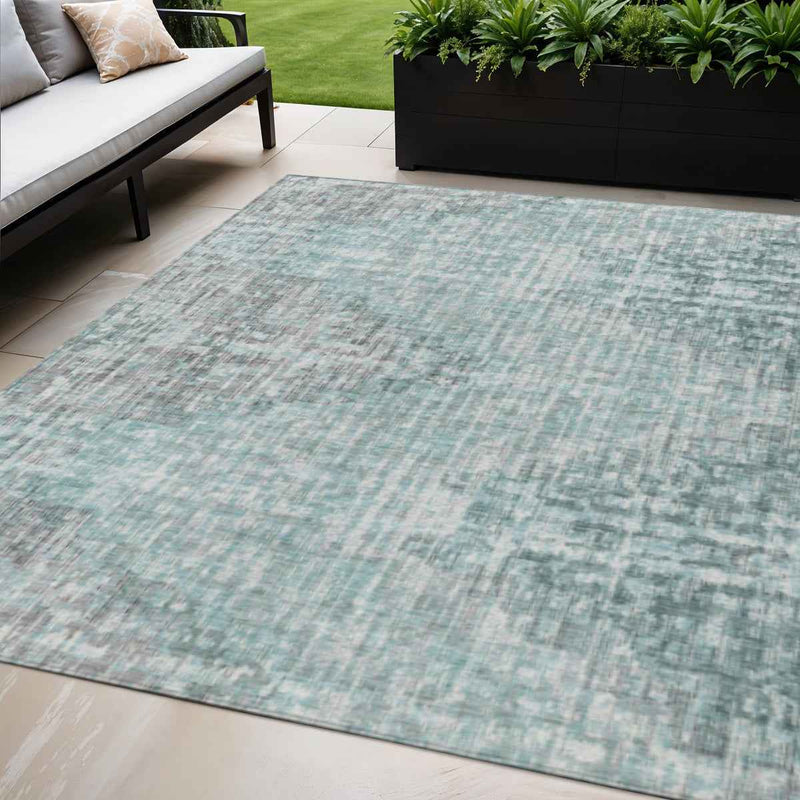 5' X 8' Teal Blue And Ivory Geometric Washable Indoor Outdoor Area Rug
