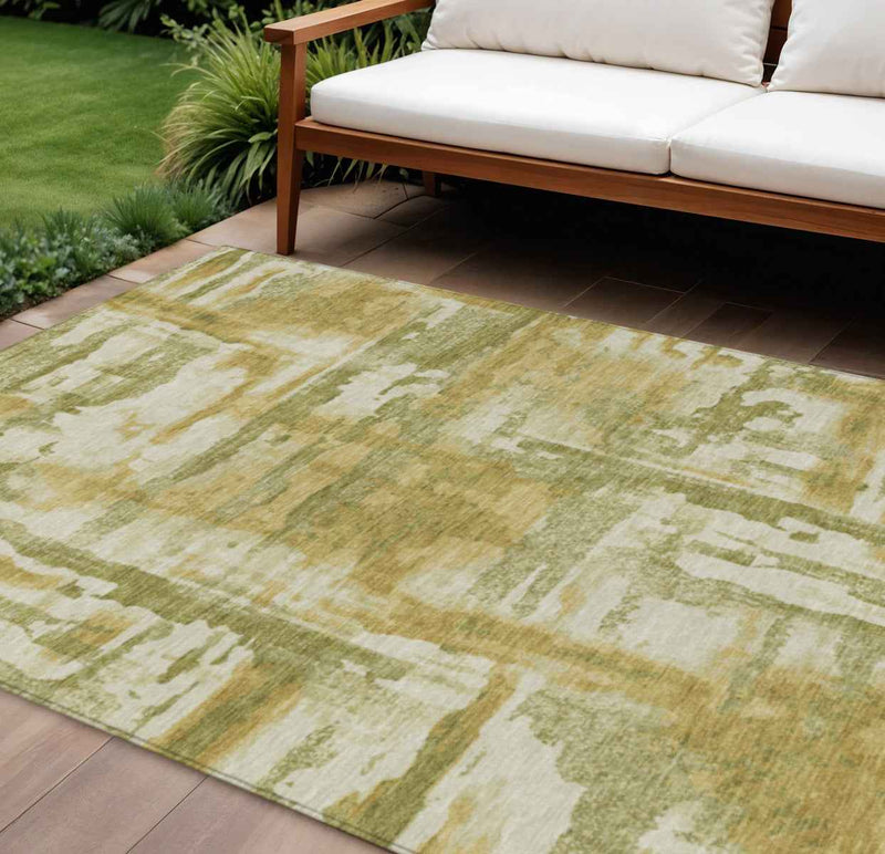 9' X 12' Artichoke Green And Gold Abstract Washable Indoor Outdoor Area Rug