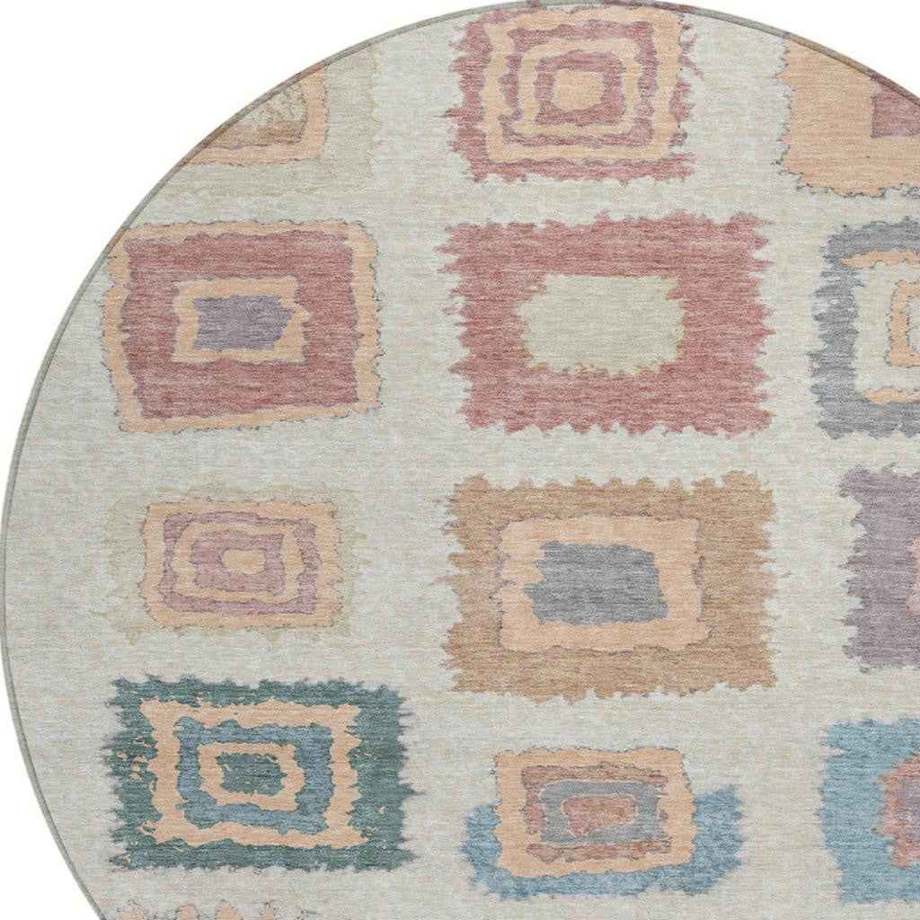 8' Peach Ivory And Beige Round Geometric Washable Indoor Outdoor Area Rug