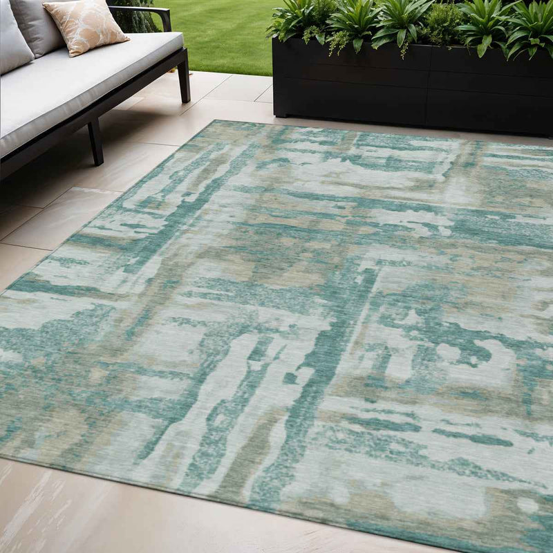 5' X 8' Teal Blue And Ivory Abstract Washable Indoor Outdoor Area Rug