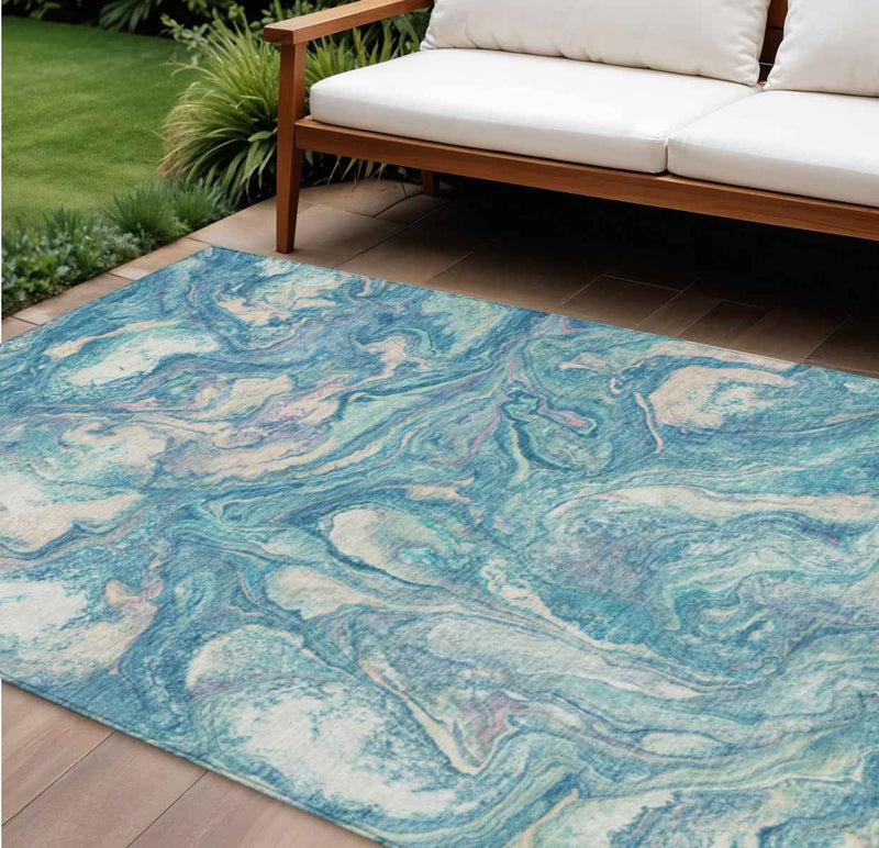 8' X 10' Teal Blue And Ivory Abstract Washable Indoor Outdoor Area Rug