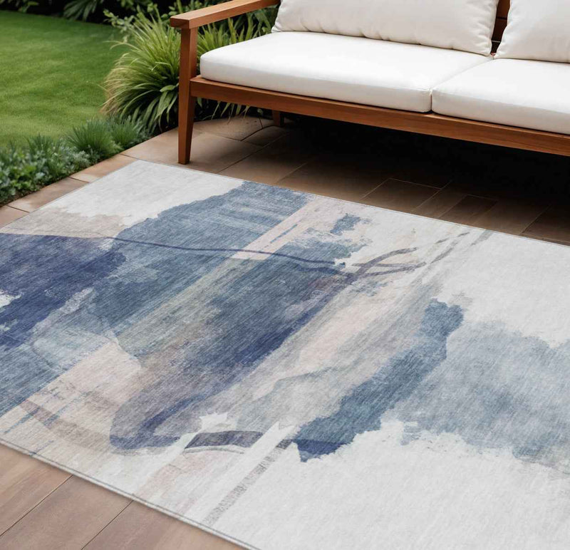 8' X 10' Blue And Ivory Abstract Washable Indoor Outdoor Area Rug