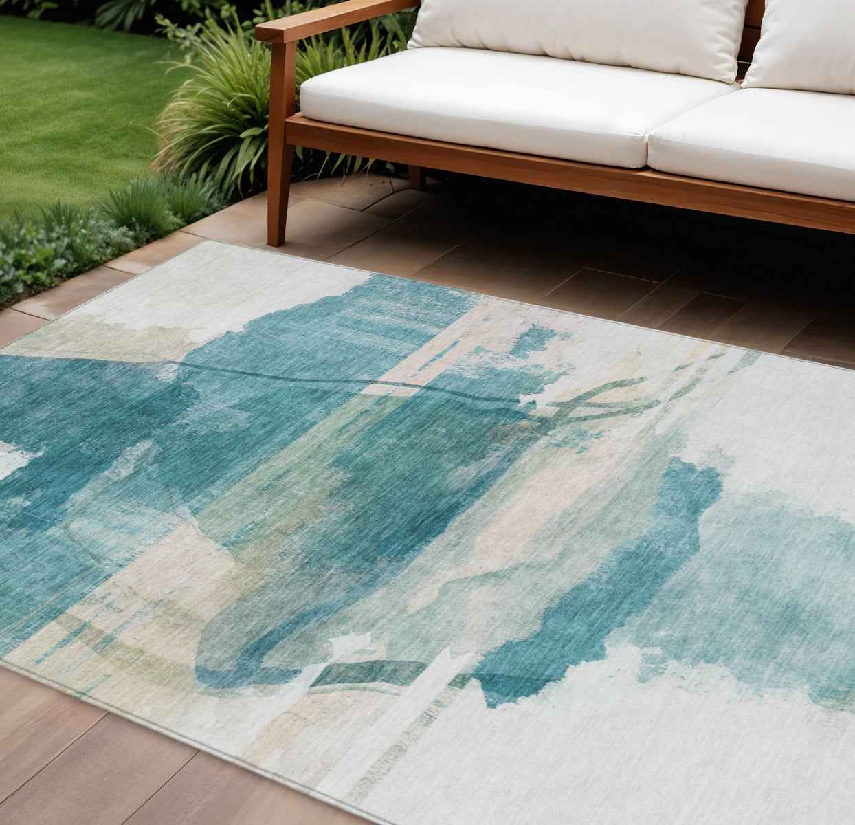 10' X 14' Teal Blue And Ivory Abstract Washable Indoor Outdoor Area Rug
