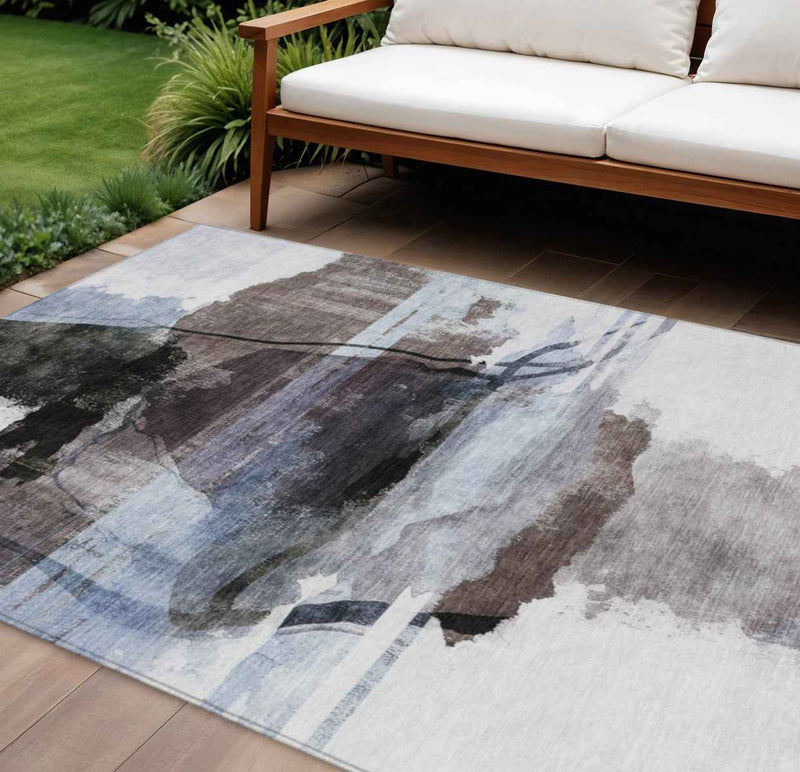 9' X 12' Brown And Ivory Abstract Washable Indoor Outdoor Area Rug