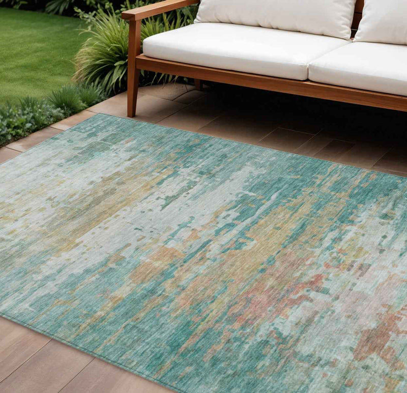 8' X 10' Teal Blue And Beige Abstract Washable Indoor Outdoor Area Rug