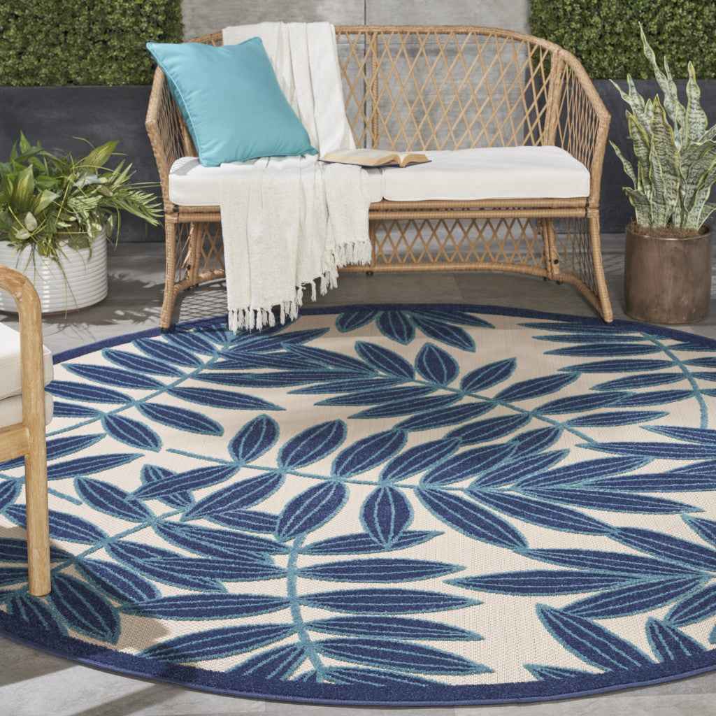 8' Blue And Ivory Round Floral Indoor Outdoor Area Rug