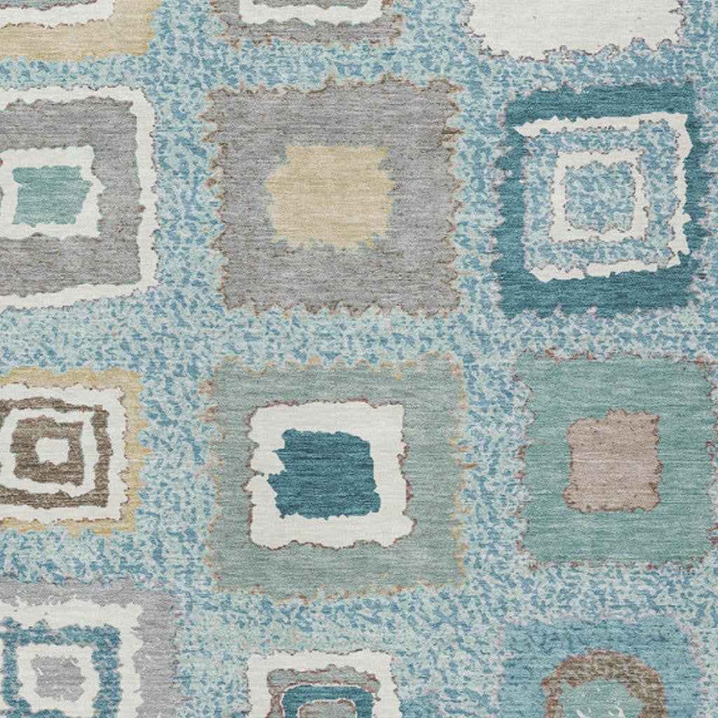 9' X 12' Teal Blue Beige And Ivory Geometric Washable Indoor Outdoor Area Rug