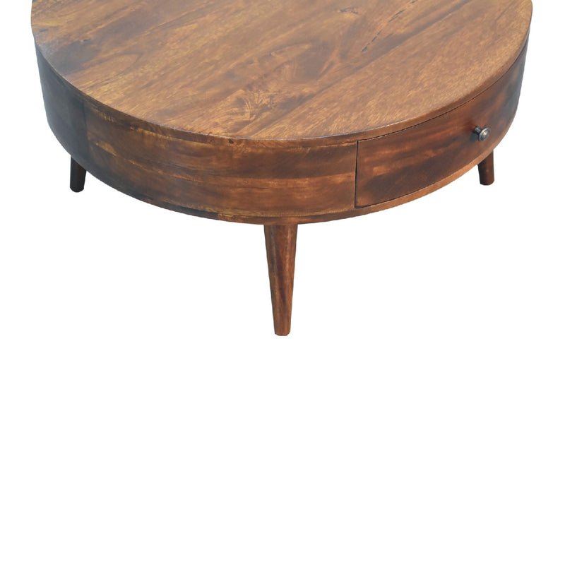 Round chestnut wood coffee table with side drawer and tapered legs