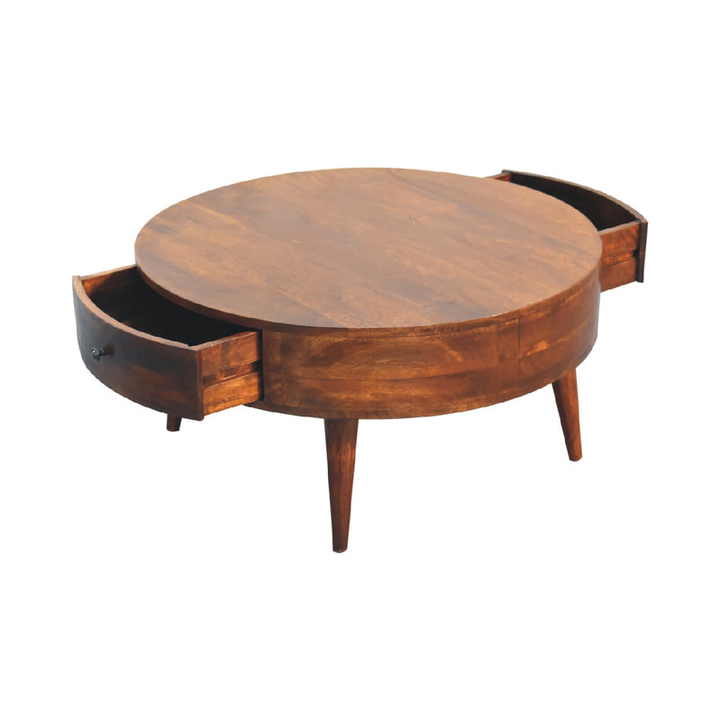 Round coffee table with open drawer bay, curved tabletop, and tapered legs