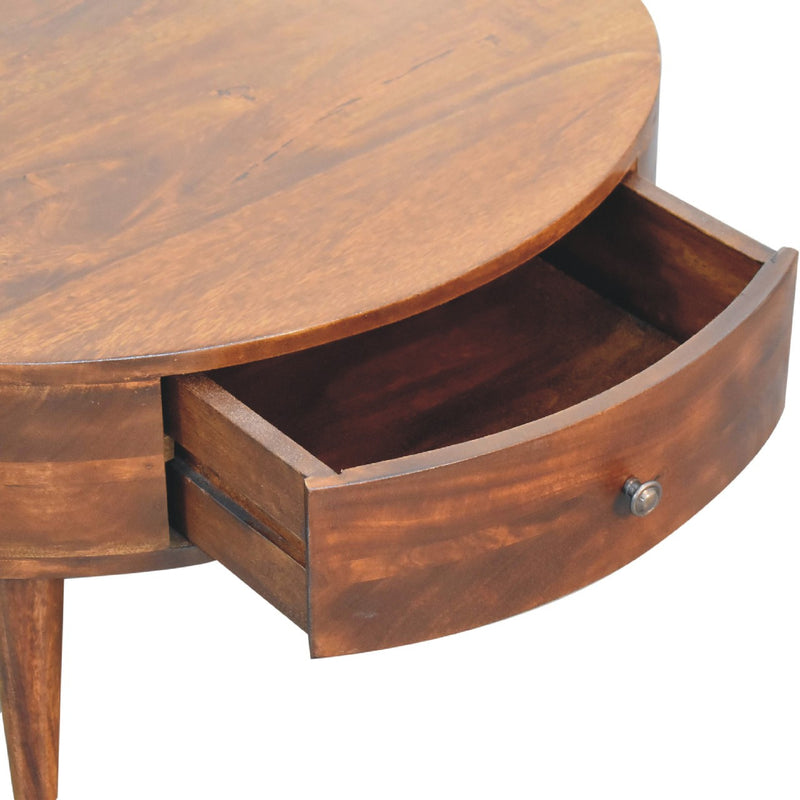 Round wood coffee table with open drawer compartment and round metal knob