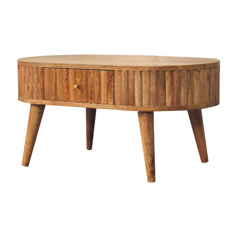 Oval solid wood coffee table with a drawer front, rounded top and four legs