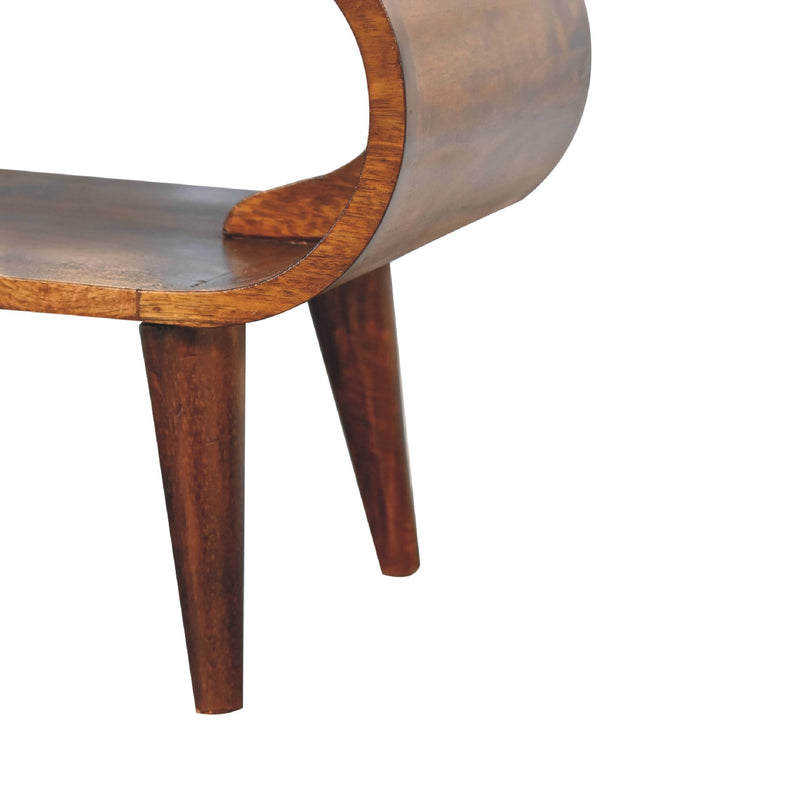 Chestnut solid wood coffee table with curved apron and straight tapered legs.