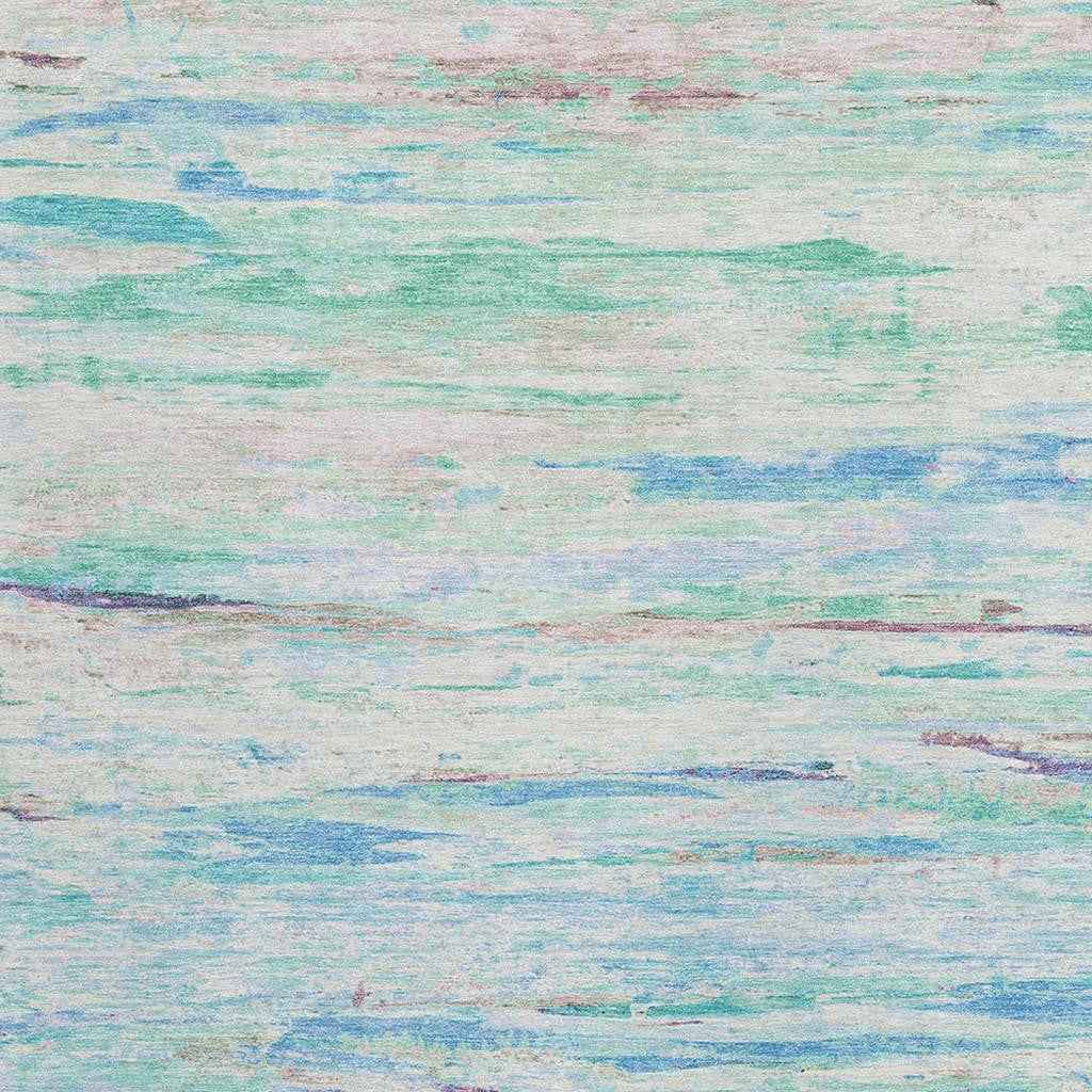 9' X 12' Teal Blue And Ivory Abstract Washable Indoor Outdoor Area Rug