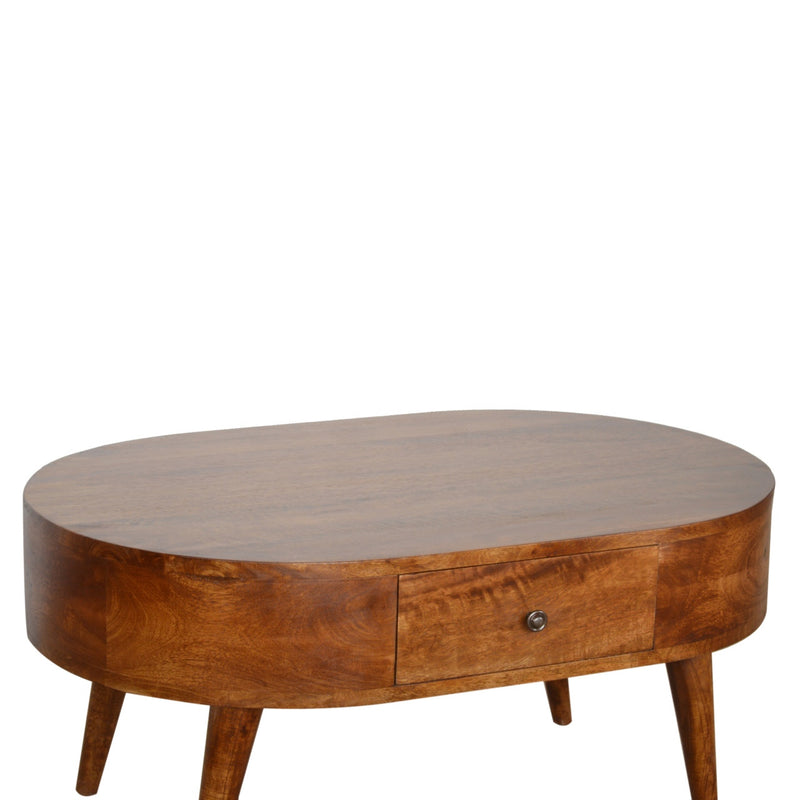 Oval wooden coffee table with front drawer and metal knob; tapered legs