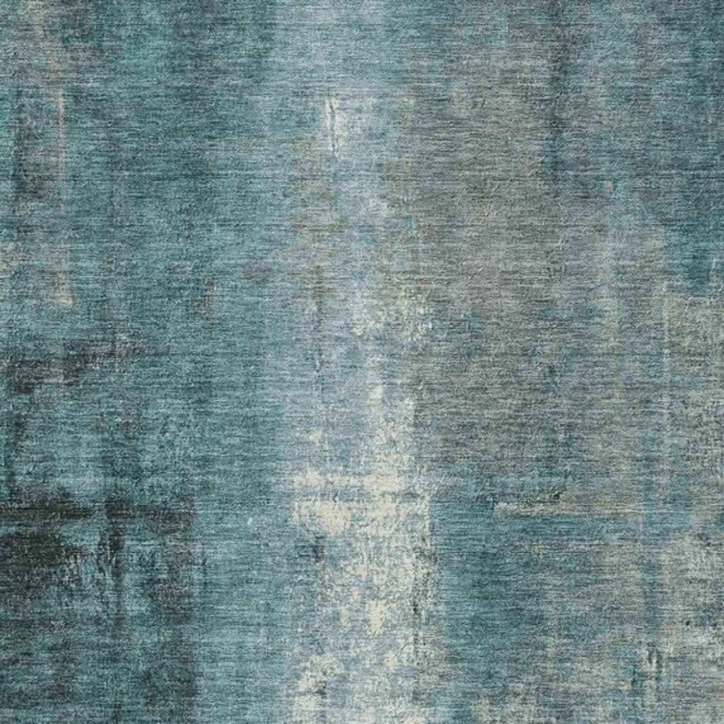 8' X 10' Teal Blue And Ivory Abstract Washable Indoor Outdoor Area Rug