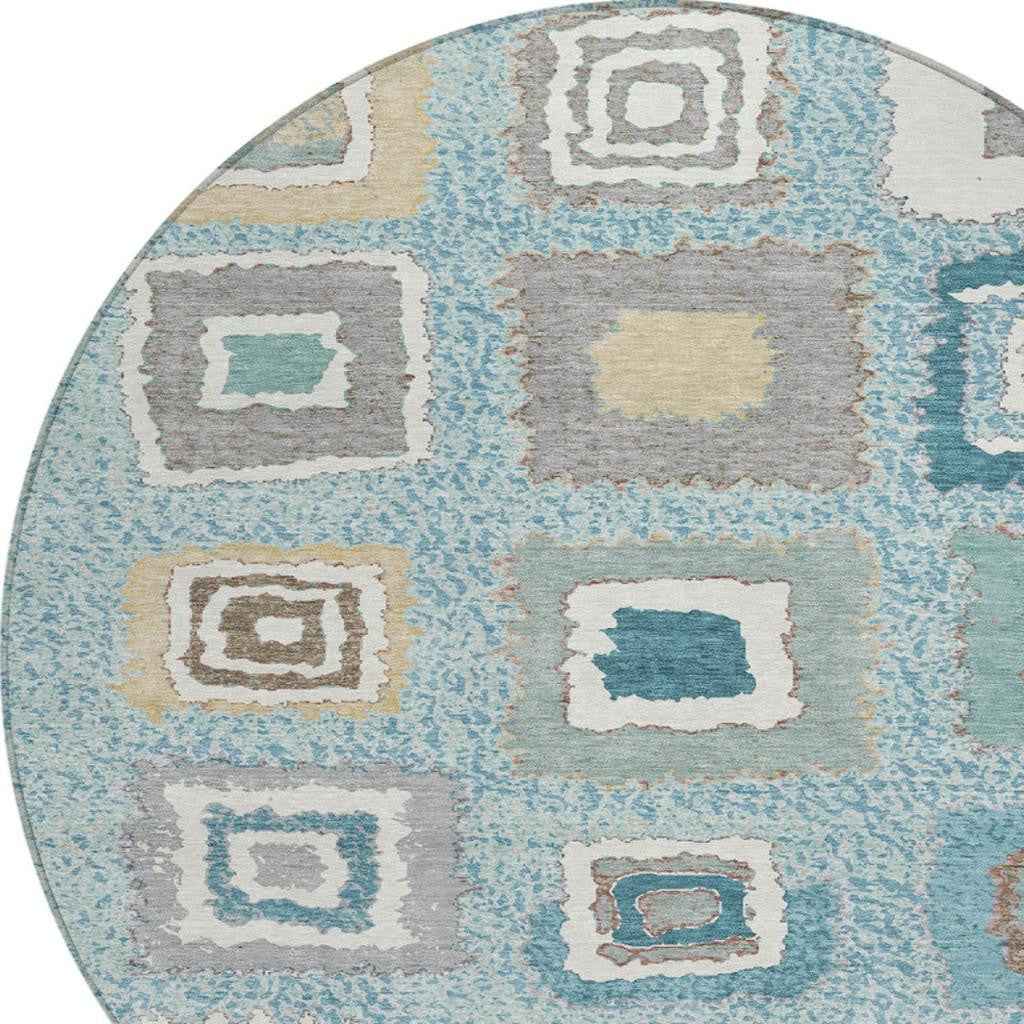 8' Teal Blue Beige And Ivory Round Geometric Washable Indoor Outdoor Area Rug
