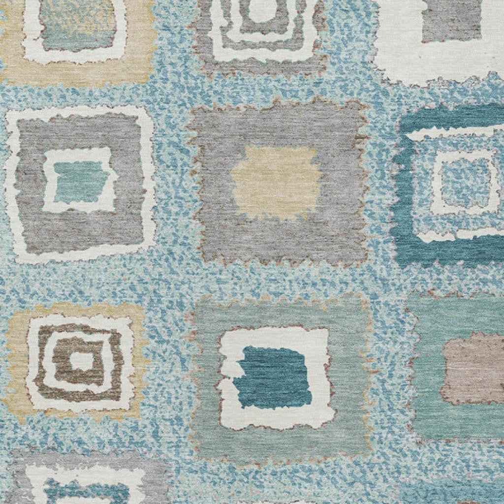 8' X 10' Teal Blue Beige And Ivory Geometric Washable Indoor Outdoor Area Rug