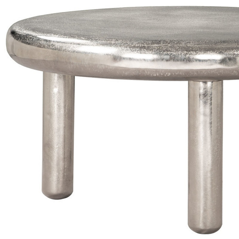 Silver round coffee table with metallic tabletop edge and three visible straight legs