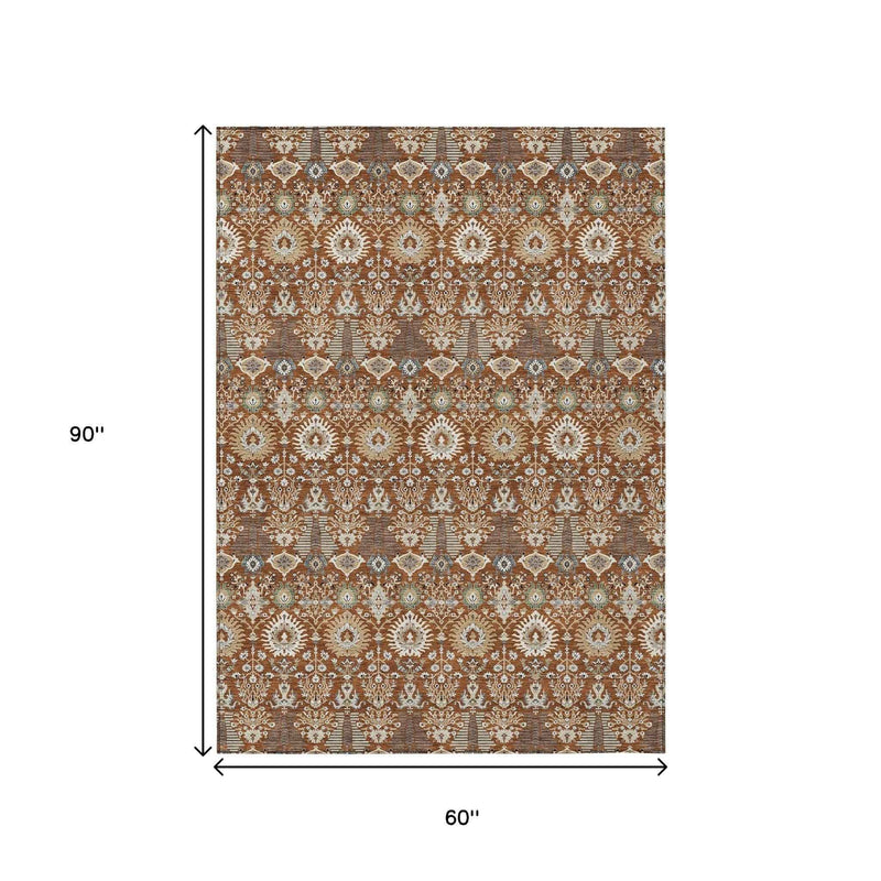 5' X 8' Rust And Ivory Floral Washable Indoor Outdoor Area Rug