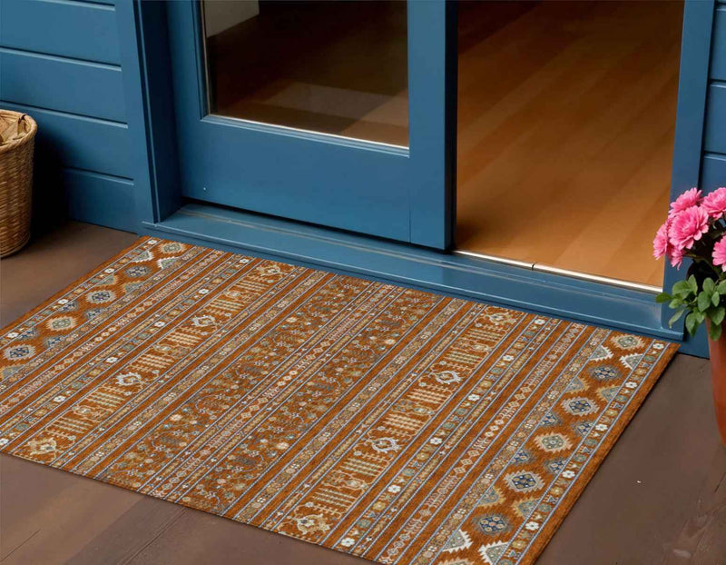 3' X 5' Rust Blue And Ivory Tribal Washable Indoor Outdoor Area Rug
