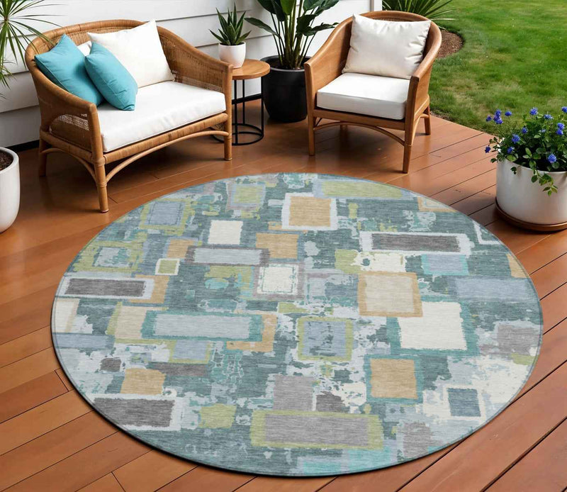 8' Teal Blue Green And Ivory Round Geometric Washable Indoor Outdoor Area Rug