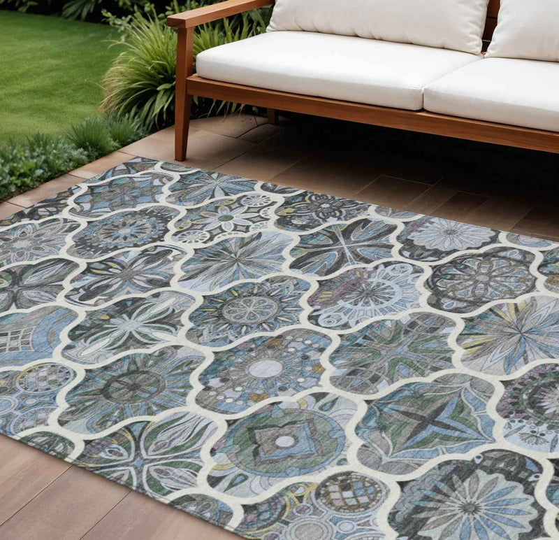 10' X 14' Blue And Ivory Quatrefoil Washable Indoor Outdoor Area Rug