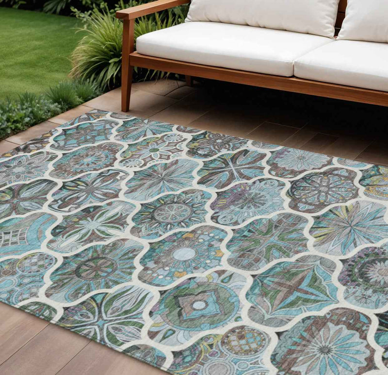 8' X 10' Teal Blue And Ivory Quatrefoil Washable Indoor Outdoor Area Rug