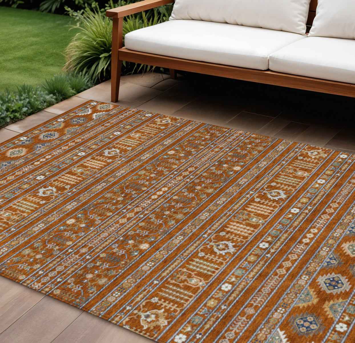 8' X 10' Rust Blue And Ivory Tribal Washable Indoor Outdoor Area Rug