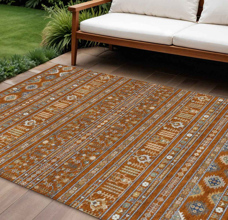8' X 10' Rust Blue And Ivory Tribal Washable Indoor Outdoor Area Rug