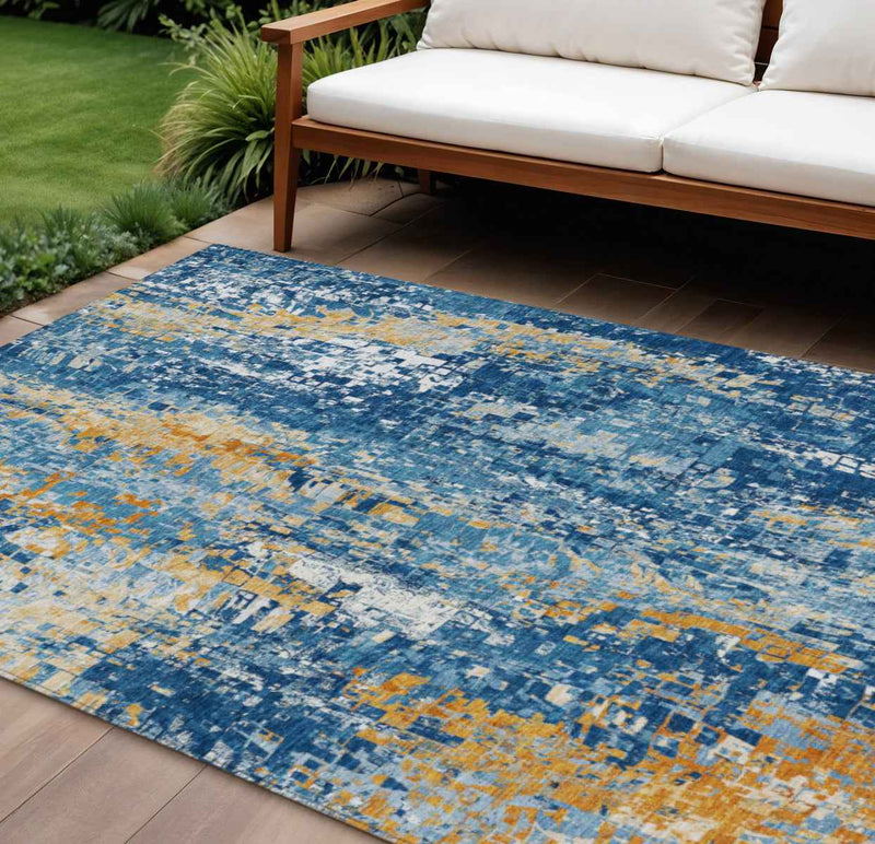 8' X 10' Navy Blue Gold And Ivory Abstract Washable Indoor Outdoor Area Rug
