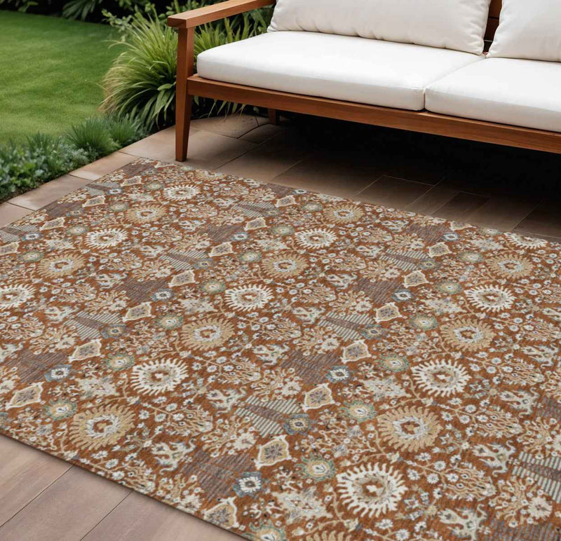 9' X 12' Rust And Ivory Floral Washable Indoor Outdoor Area Rug