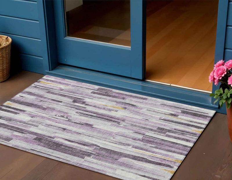 3' X 5' Lavender And Ivory Striped Washable Indoor Outdoor Area Rug