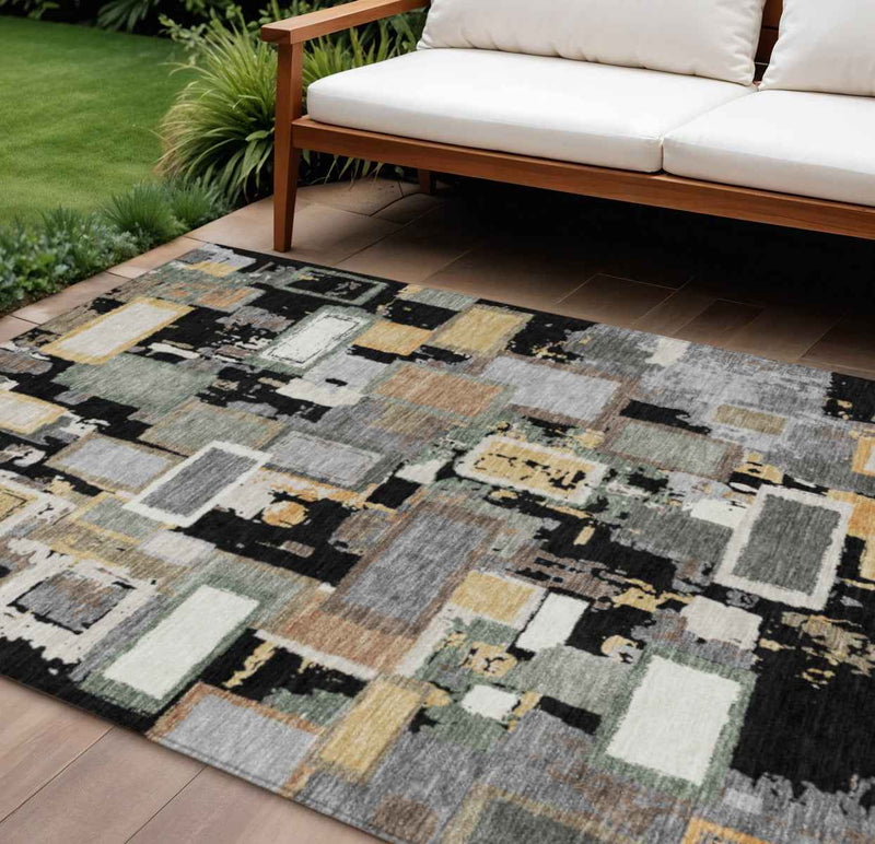9' X 12' Black Gold And Ivory Geometric Washable Indoor Outdoor Area Rug