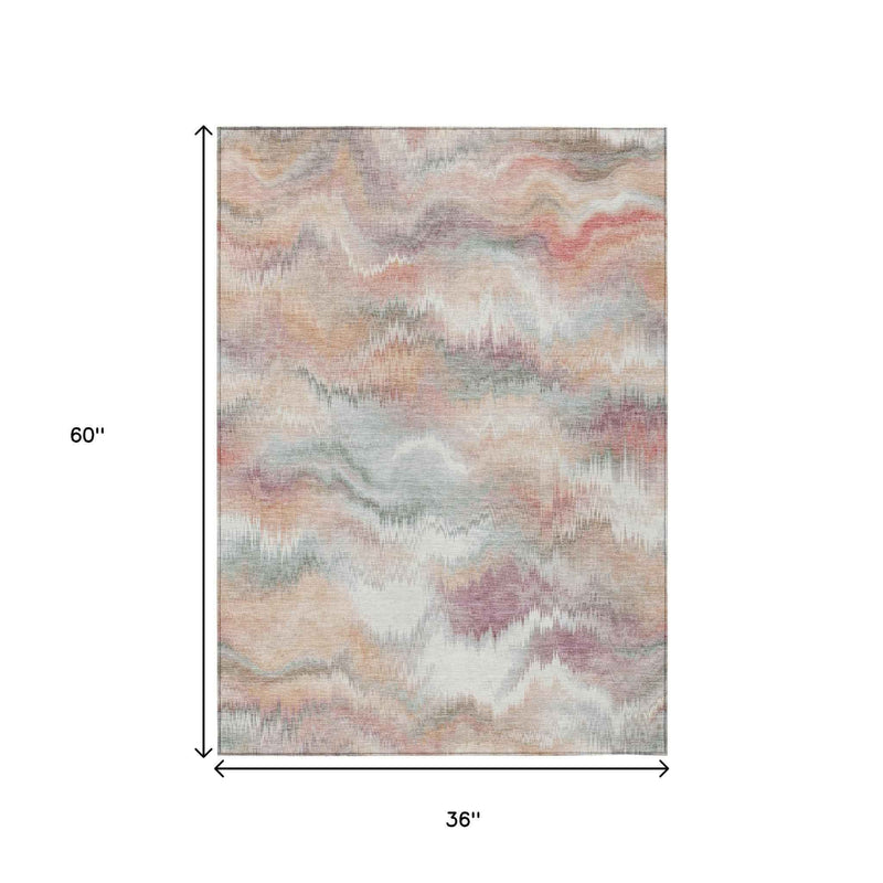 3' X 5' Peach And Ivory Abstract Washable Indoor Outdoor Area Rug