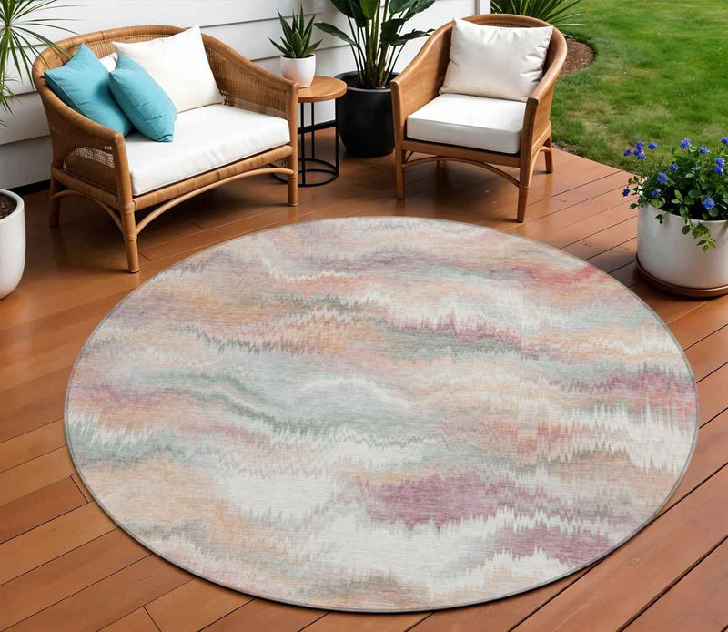 8' Peach And Ivory Round Abstract Washable Indoor Outdoor Area Rug