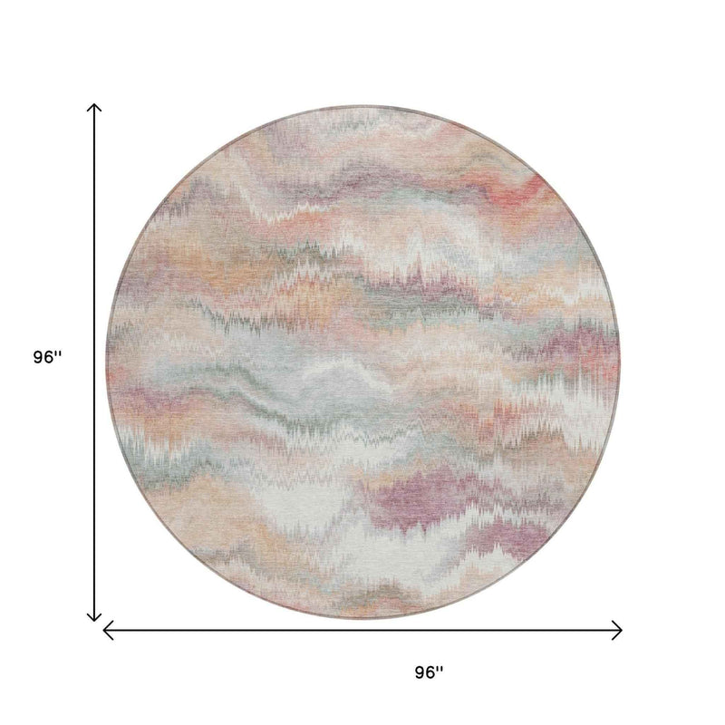8' Peach And Ivory Round Abstract Washable Indoor Outdoor Area Rug