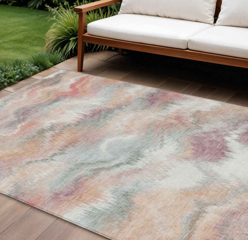 8' X 10' Peach And Ivory Abstract Washable Indoor Outdoor Area Rug