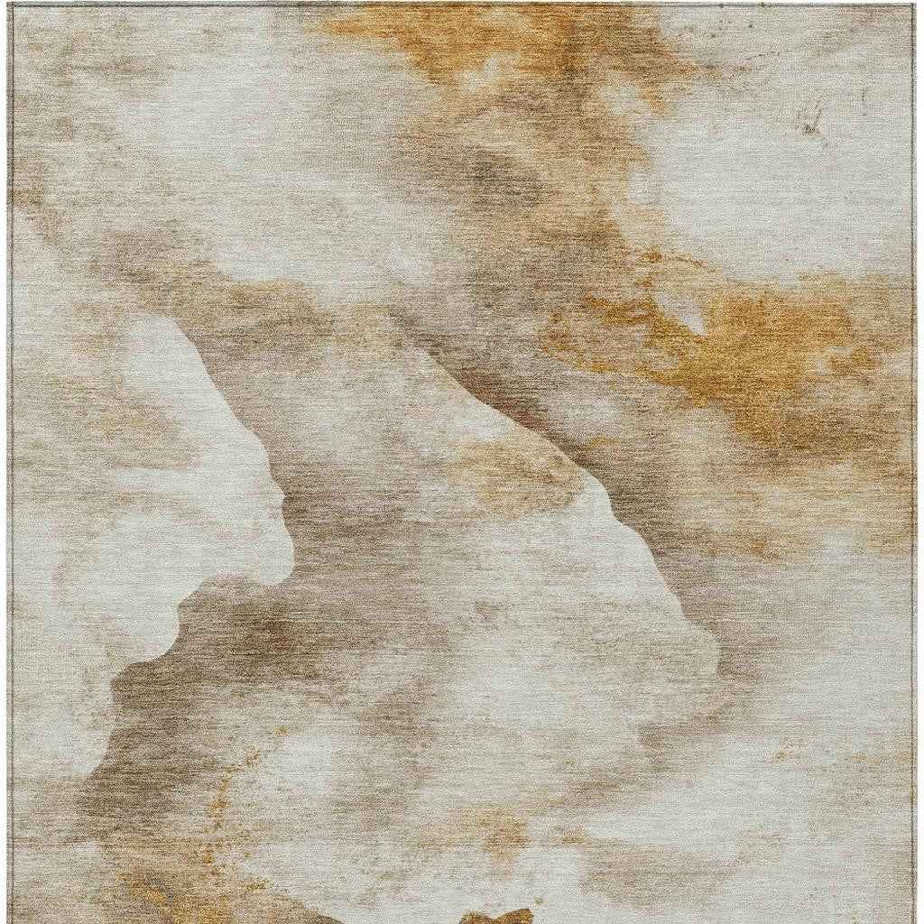 5' X 8' Beige And Gold Abstract Washable Indoor Outdoor Area Rug