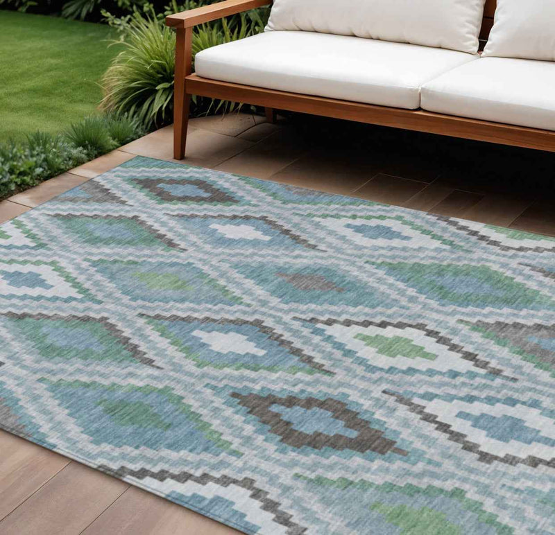 8' X 10' Teal Blue Ivory And Green Geometric Washable Indoor Outdoor Area Rug