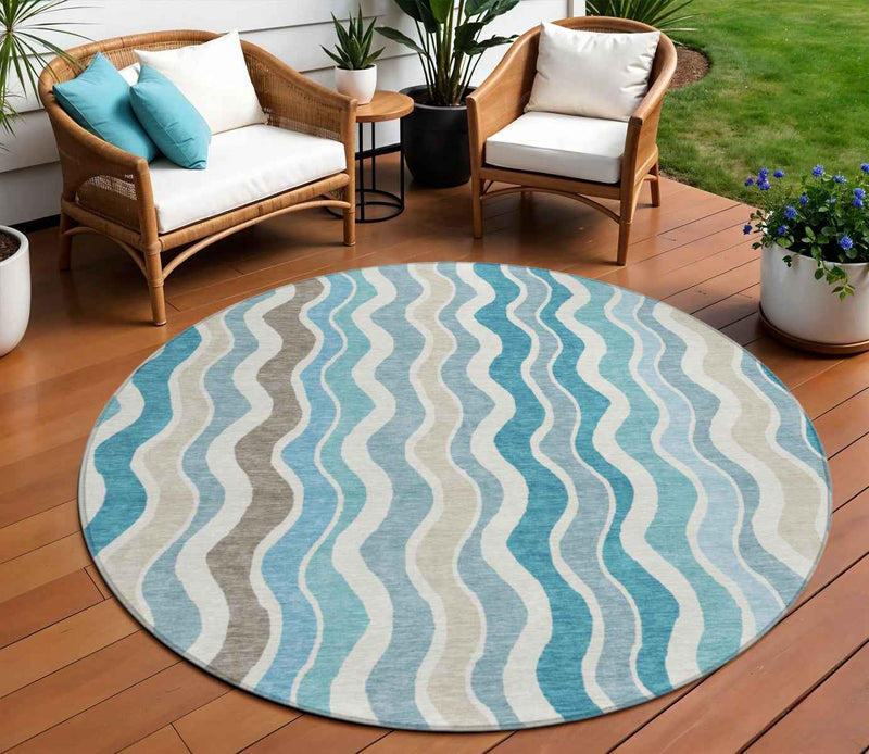 8' Teal Blue Ivory And Beige Round Striped Washable Indoor Outdoor Area Rug