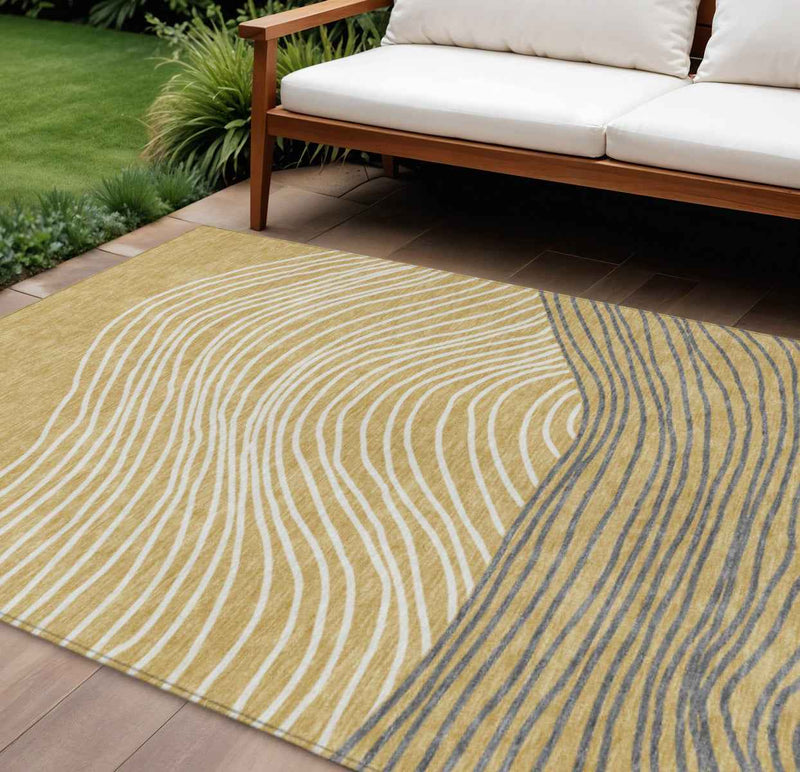 8' X 10' Gold Ivory And Charcoal Striped Washable Indoor Outdoor Area Rug