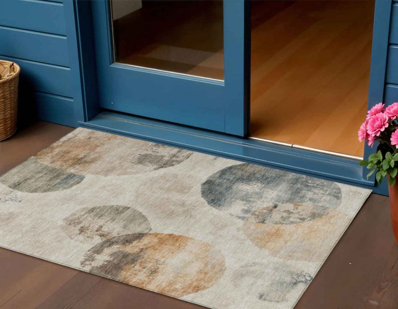 3' X 5' Beige Khaki And Ivory Abstract Washable Indoor Outdoor Area Rug