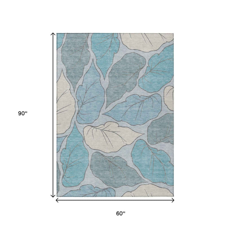 5' X 8' Teal Blue And Ivory Botanical Leaves Washable Indoor Outdoor Area Rug