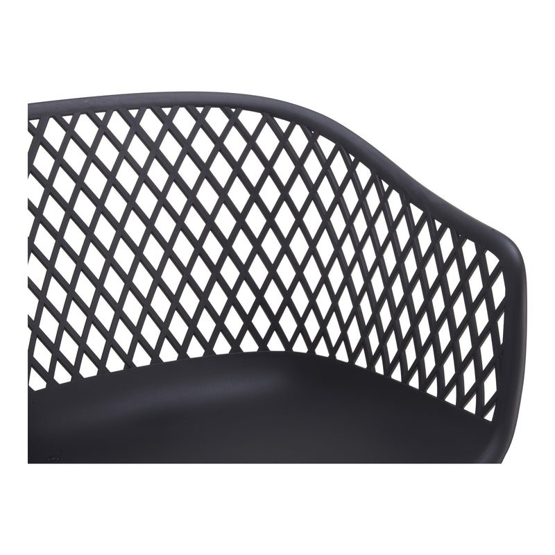 Close-up of black lattice back on a plastic outdoor stacking chair