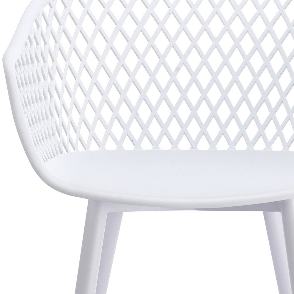 White plastic outdoor chair back with diamond lattice pattern and smooth curved seat