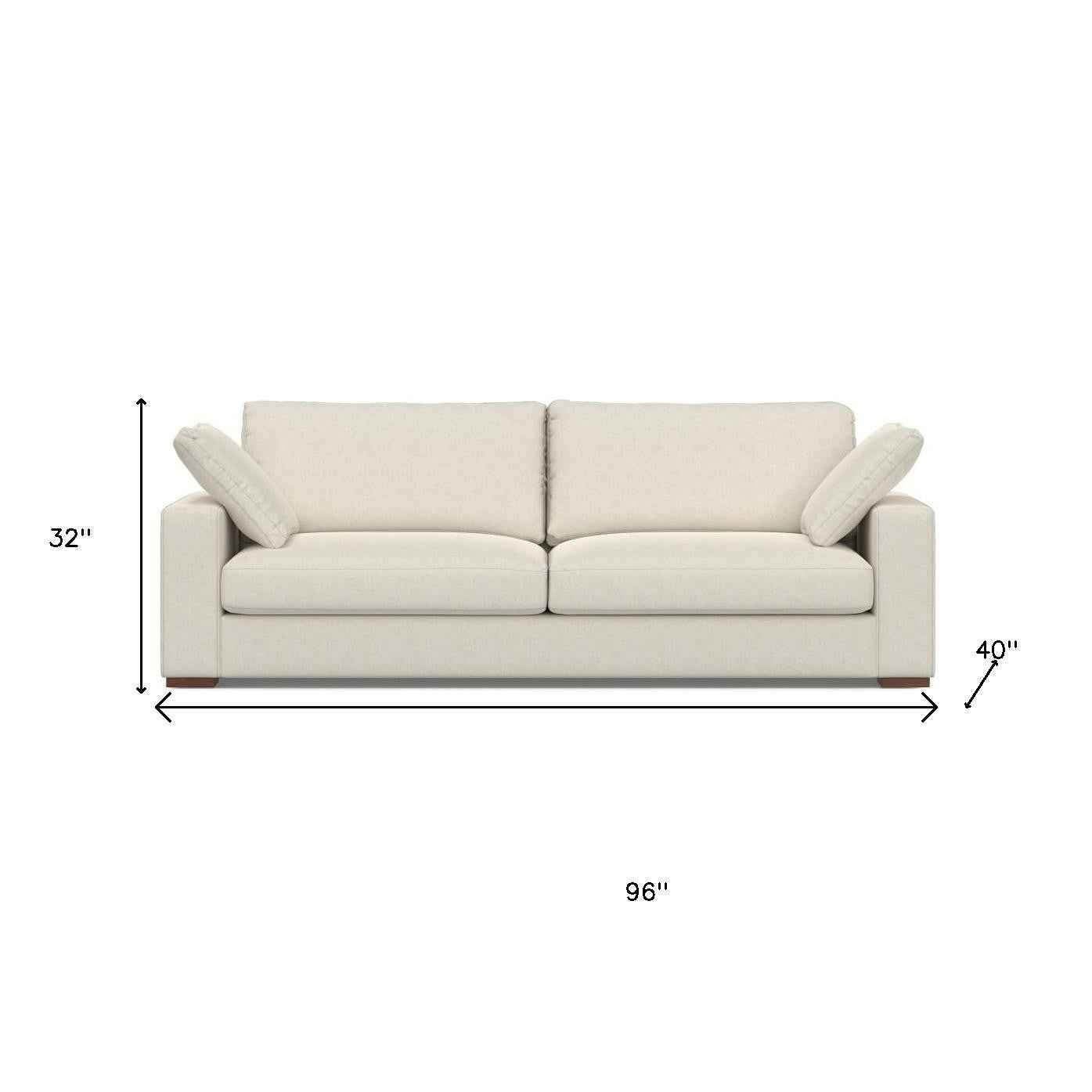 96" Cream Fabric Sofa With Brown Legs