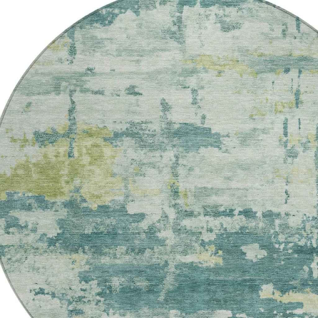 8' Teal Blue Ivory And Gold Round Abstract Washable Indoor Outdoor Area Rug