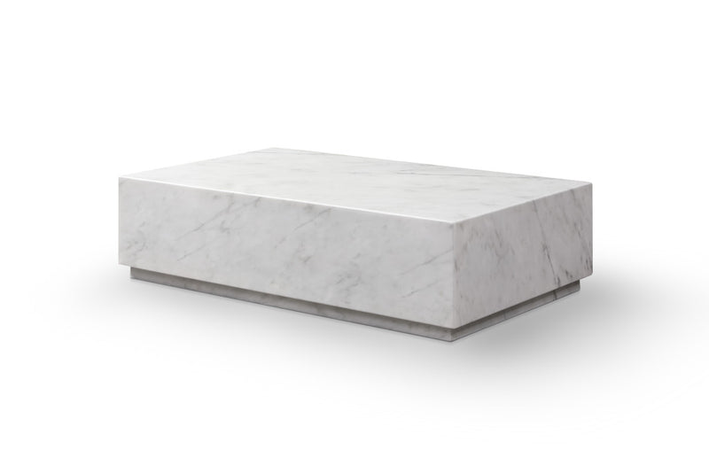 White marble block coffee table with squared edges and low stone base