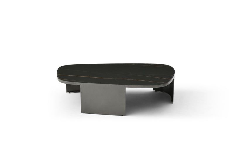 Low oval black ceramic coffee table with gold veining and dark gray steel pedestal base